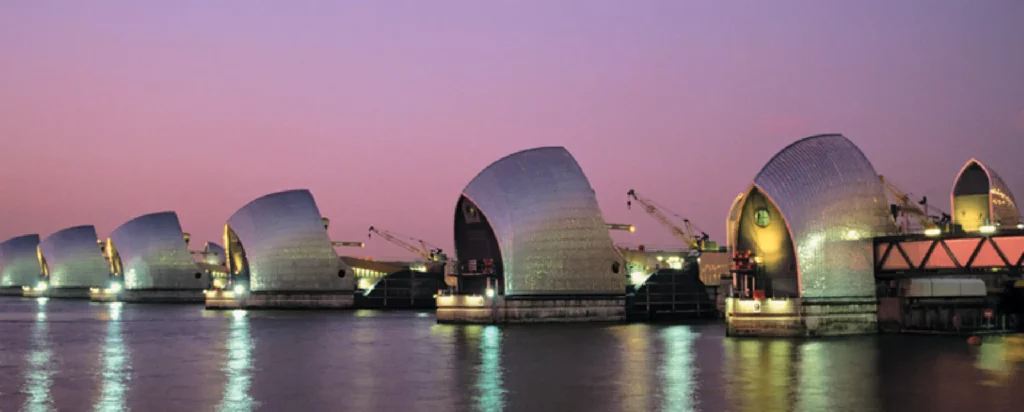 River waters shimmering at dusk under a violet sky